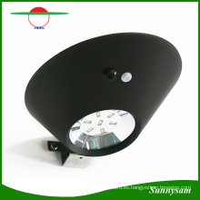 Lámpara solar de pared solar al aire libre de la luz 2W Oval 7 luces del sensor de movimiento LED Luz de seguridad inalámbrica del jardín para la terraza del garaje de la yarda del patio del camino de la pared